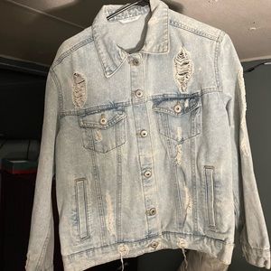 Women’s light wash ripped jean jacket